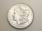 1884 $1 MORGAN SILVER ONE DOLLAR CH/GEM BU