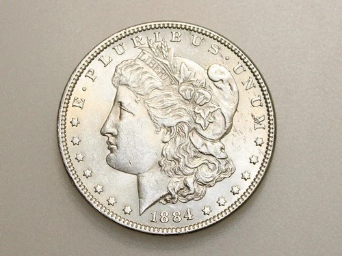 1884 $1 MORGAN SILVER ONE DOLLAR CH/GEM BU