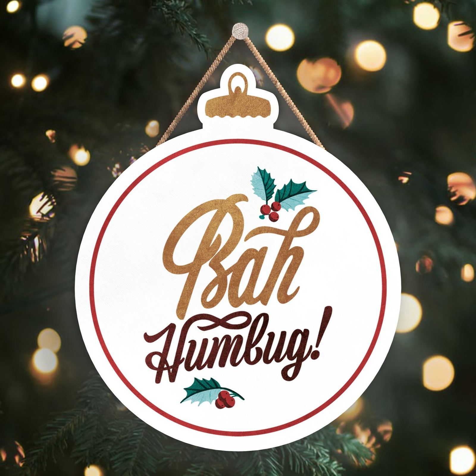 BAH HUMBUG GOLD AND RED TYPOGRAPHY ON A BAUBLE SHAPED WOODEN HANGING PLAQUE