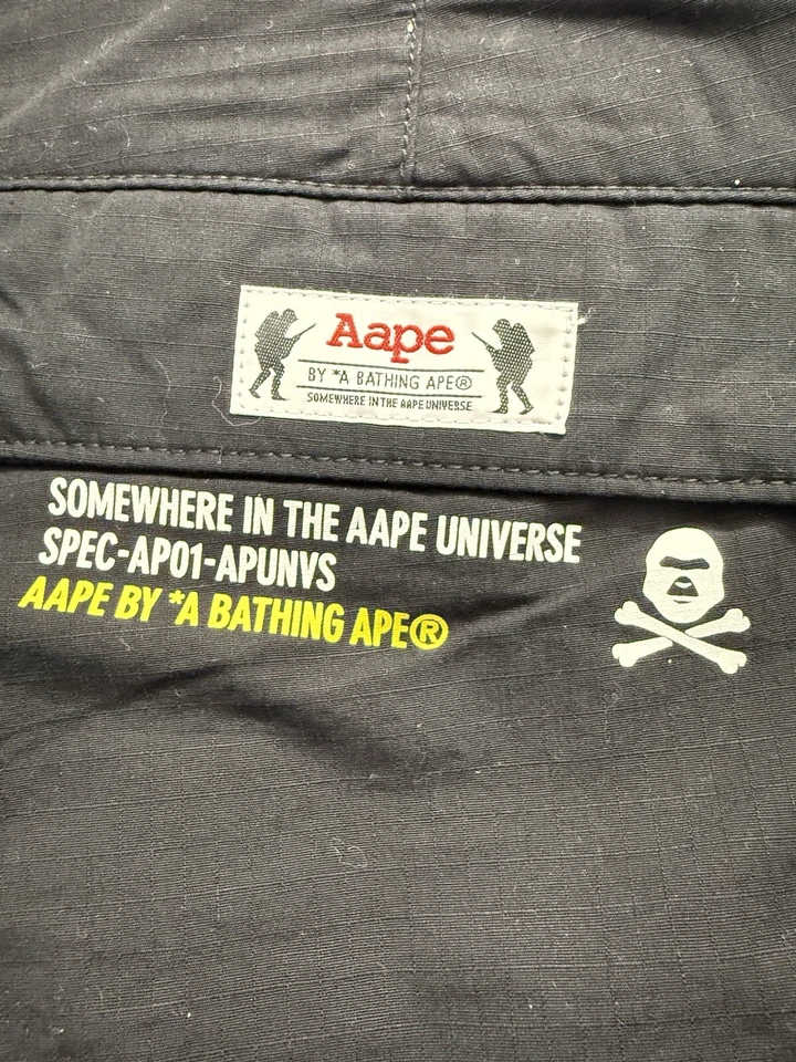 Bermuda Aape By *A BATHING APE preta com estampa de logotipo solta exército carga masculina tamanho médio  - Imagem 4 de 4