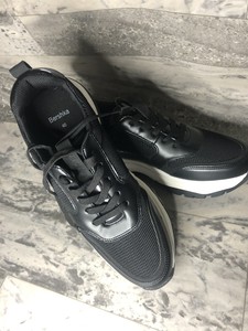 black snakeskin trainers