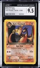 2000 POKEMON TEAM ROCKET 1ST ED #21 DARK CHARIZARD CGC 9.5