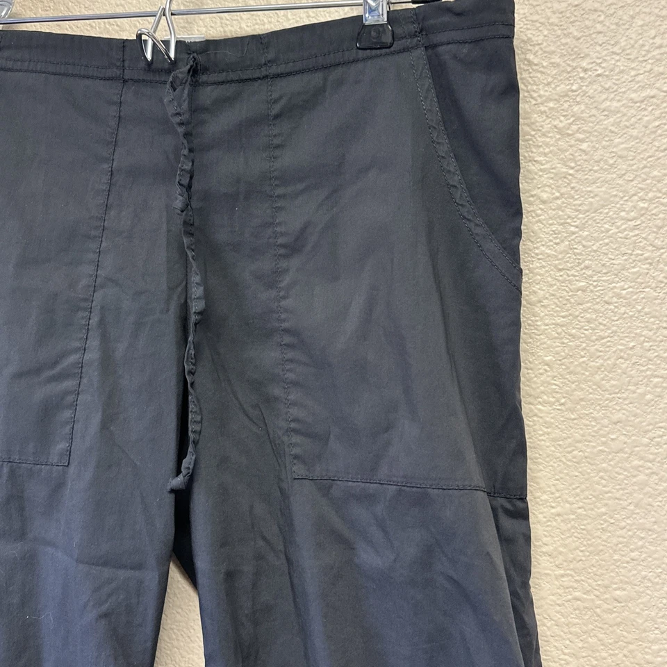 Pantalón de Yoga Be Present XS Recortado Abertura Lateral Negro Bolsillos Cómodo Elástico Foto 2 de 4