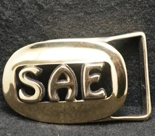 WL11164 *NOS* VINTAGE 1970s *S.A.E.* ENGINEERING COMPANY MENS BRASS BELT BUCKLE