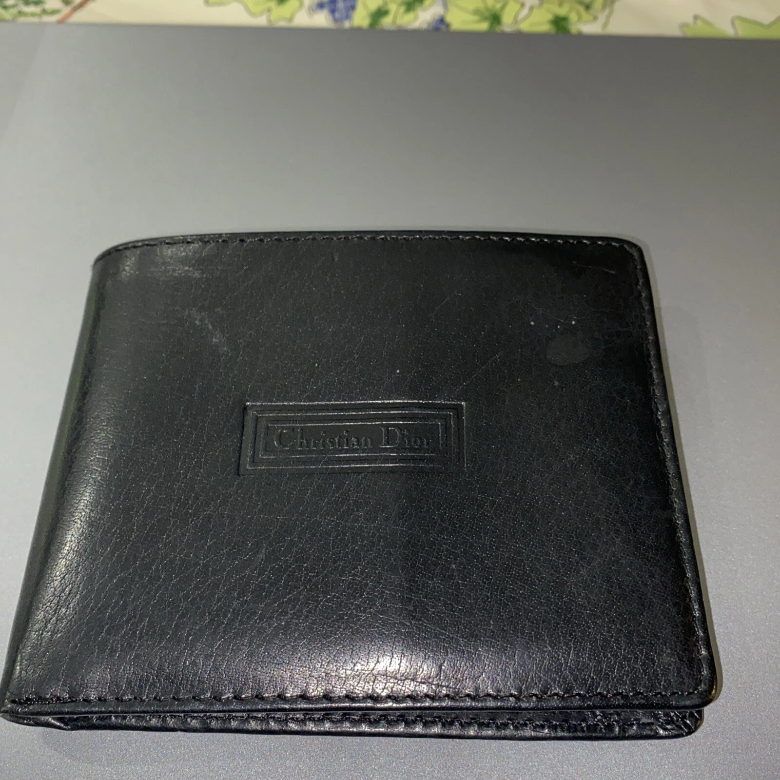 Portefeuille Christian Dior vintage bi pli cuir marron foncé homme logo en relief