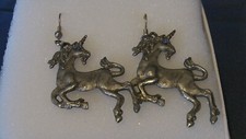 Vintage earrings, Unicorn design, Pewter w/Blue topaz eyes.