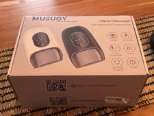Musugy Hand Massager. NEW!! Open Box.
