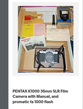 PENTAX K1000 35mm SLR Film Camera with Manual, and promatic fa 1000 flash