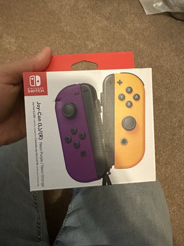 Nintendo Switch Joy-Con (L)/(R) - Púrpura Neón/Naranja Neón - 100% AUTÉNTICO - Imagen 1 de 2