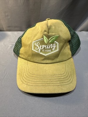 Spring Is Here' yellow and green trucker hat.