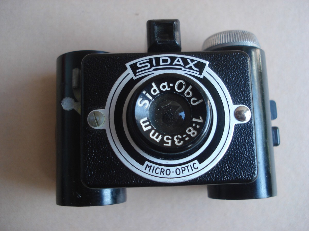 Ancien Appareil Photo Miniature SIDAX En Bakélite Avec Film Négatif - Vintage Et Fonctionnel