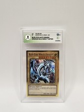 Drago Bianco Occhi Blu MGED-EN001 GRAAD 8 Prima Edizione Yugioh Card