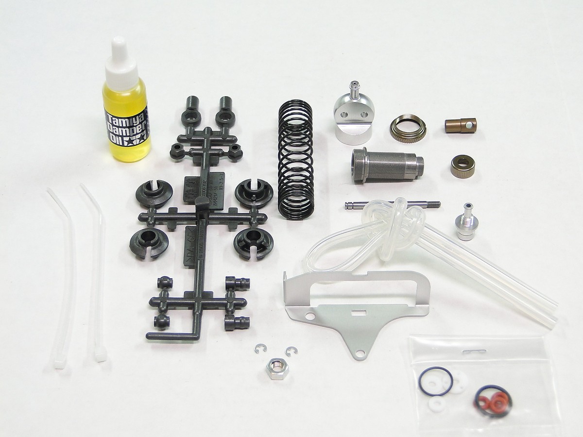 NEW TAMIYA SUPER CHAMP/FIGHTING BUGGY Shocks Set Rear +