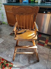 Vintage wooden high chair about 75 years old