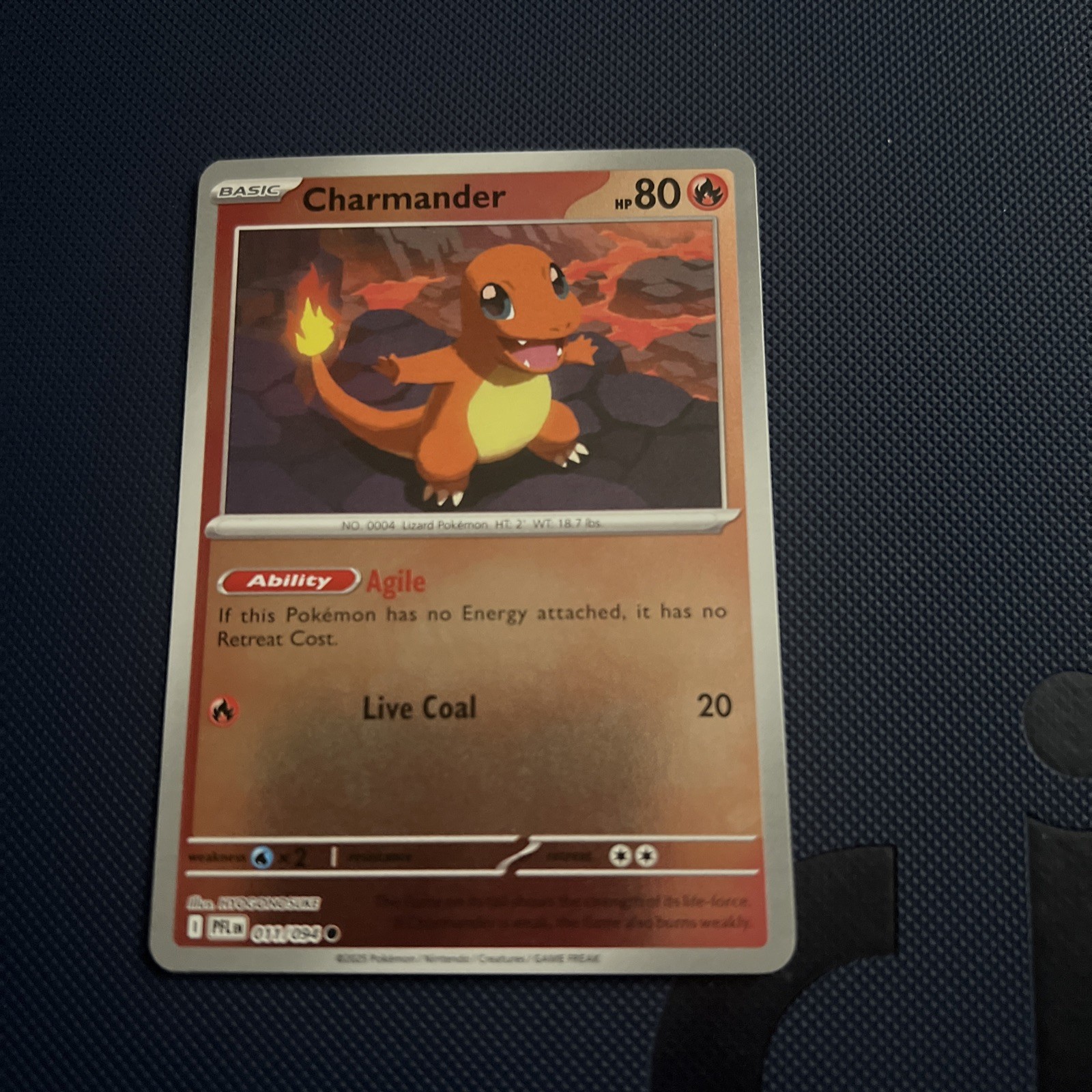 Charmander 011/094 Reverse Holo Pokemon TCG: Phantasmal Flames Near Mint (NM)