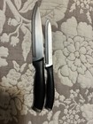 JA Henckels Intl Stainless Steel, Black Handle, Silver Cap Kitchen Knives — photo 1