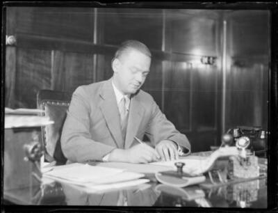 Eric Callaway sitting at his desk shortly after being made general - Old Photo