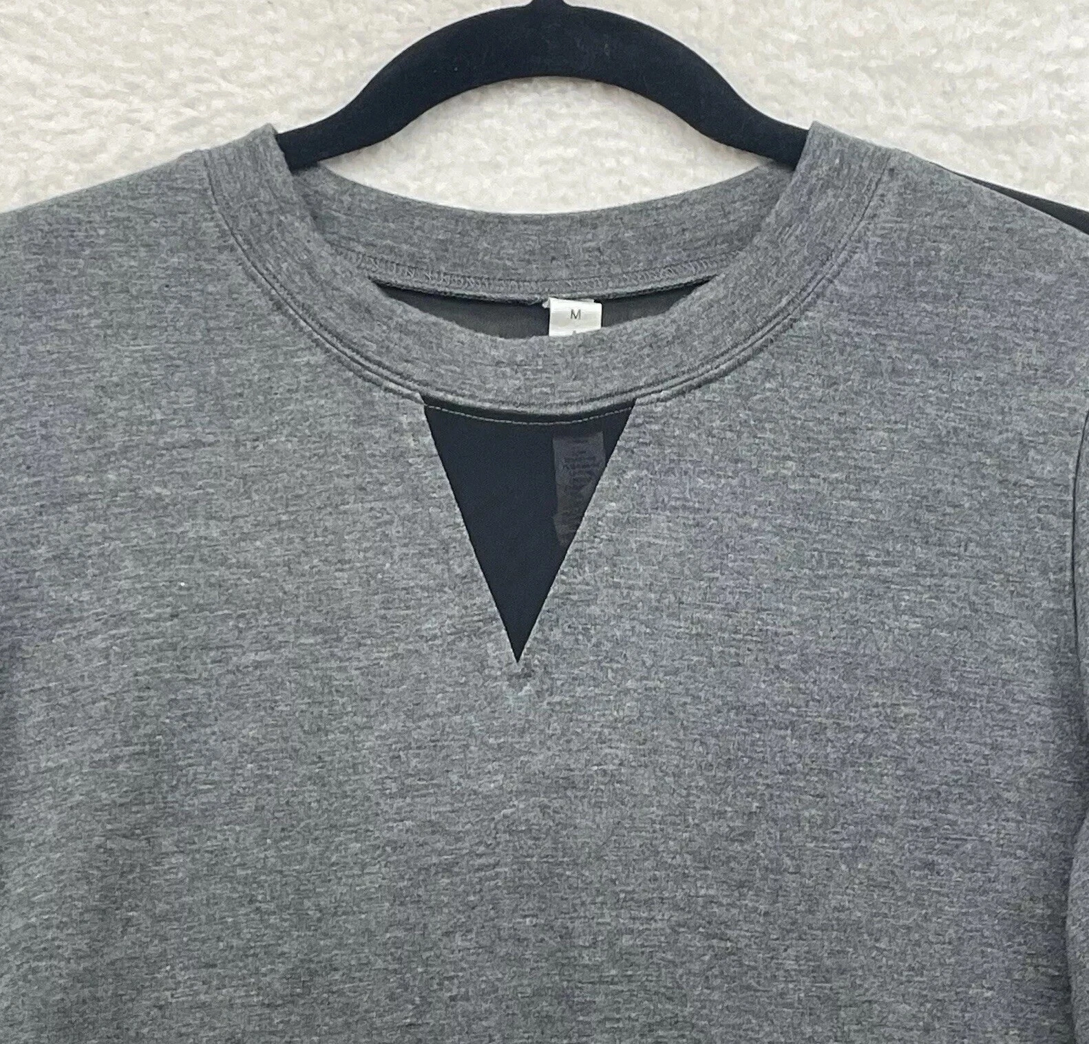 alo-yoga serene mesh cuff finger loop gym workout shirt
