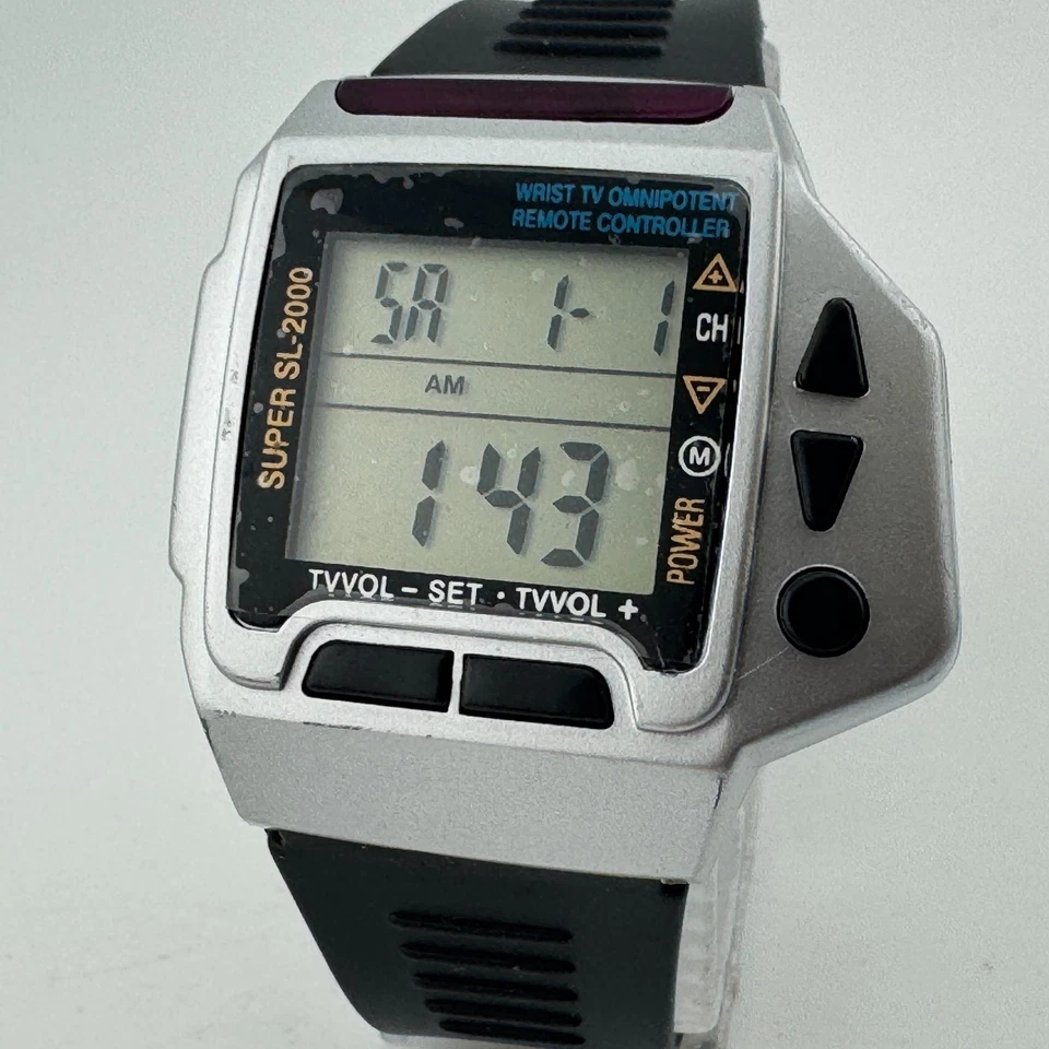 Reloj de cuarzo digital de colección para hombre con control remoto omnipotente TV de muñeca batería nueva Foto 2 de 4