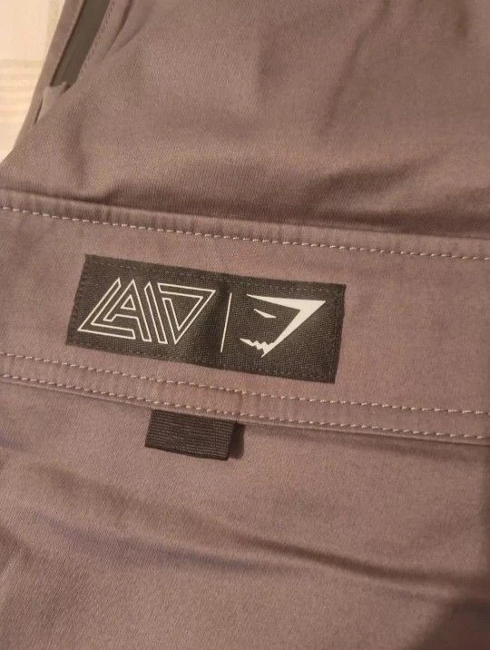 [SEALED] S/M Gymshark X DAVID LAID CARGO PANTS - Wolf Grey
Opens in a new window or tab