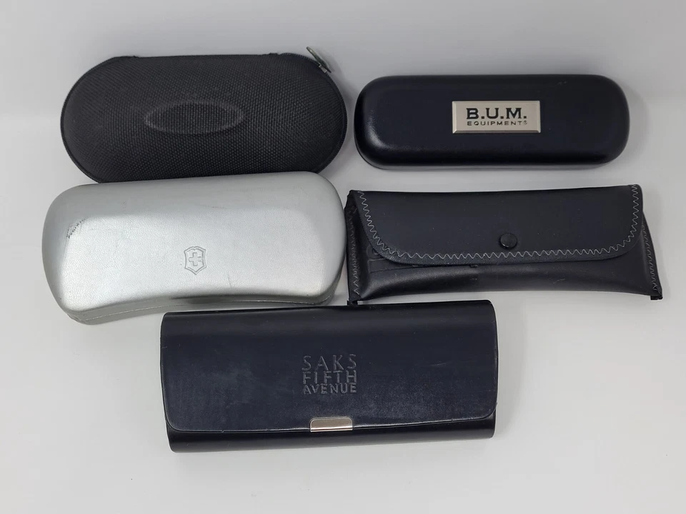 Lote de (7) estuches y bolsas para gafas de sol - Saks Oakley Bum Swiss - De colección Foto 2 de 4