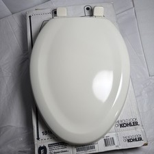 KOHLER Stonewood Elongated Quiet-Close Toilet Seat in Biscuit K-20466-96