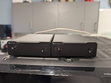 Pair of Fosi Audio V3 monoblock power amplifiers.