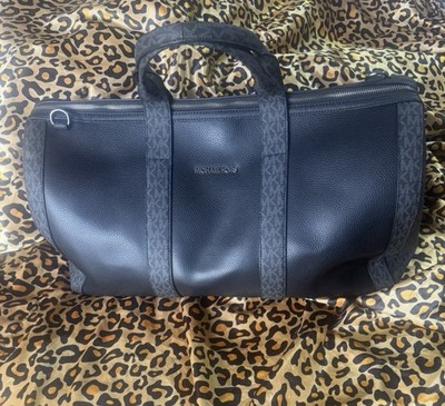 Michael Kors Black Leather Duffle Bag with Detachable Strap and Pockets