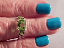 2.07 Ct. Cushion Cut Three Stone Peridot Sterling Silver Ring Free Sizing