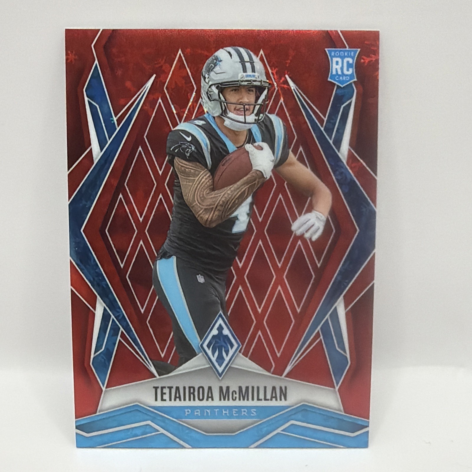 2025 Panini Phoenix #155 Tetairoa McMillan Red Winter Prizm #/399