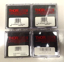 THORLABS 4 PCS ASSTD LENSES  1 x LA1461-A 1 x LA1978-A 1 x LA1433-A 1 xLA1708-B