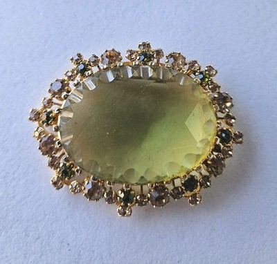 Vintage made in AUSTRIA Large Center Rhinestone gorgeous Brooch green gold tone