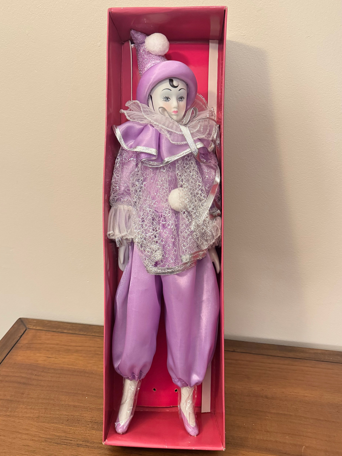 Vintage Harlequin Clown Porcelain Figurine with Elegant Clothing Detail  