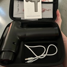 AYURA Massage Gun with several massage heads