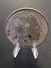 1 TROY OZ .999 FINE SILVER ROUND.