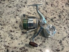Pflueger Trion GX-7 Spinning Fishing Reel rosewood handle plus extra Spool.