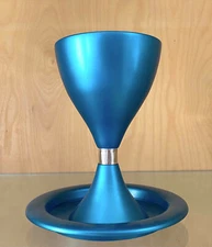 Modern blue metal kiddush kiddish cup with matching saucer.