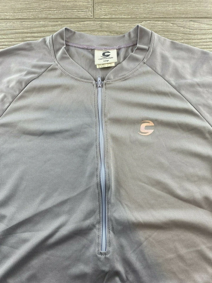 Camisa de ciclismo Cannondale grande morada para mujer, manga corta con cremallera 1/4 Foto 2 de 4