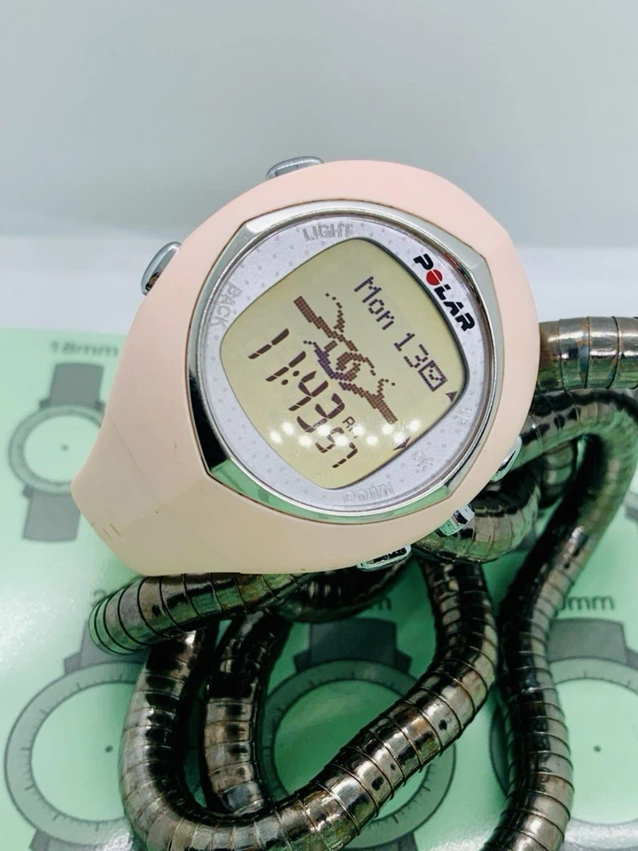 Reloj digital rastreador de actividad física Polar F6 para mujer rosa plateado solo batería nueva Foto 2 de 4