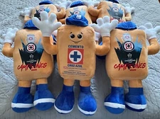 STUFFED ANIMAL “COSTALITO ” MASCOTA DEL EQUIPO CRUZ AZUL CONCACAF CAMPEÓN 2025