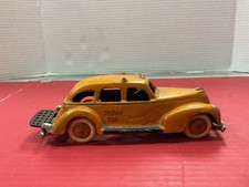 cast iron 1930s-1940s yellow cab toy car