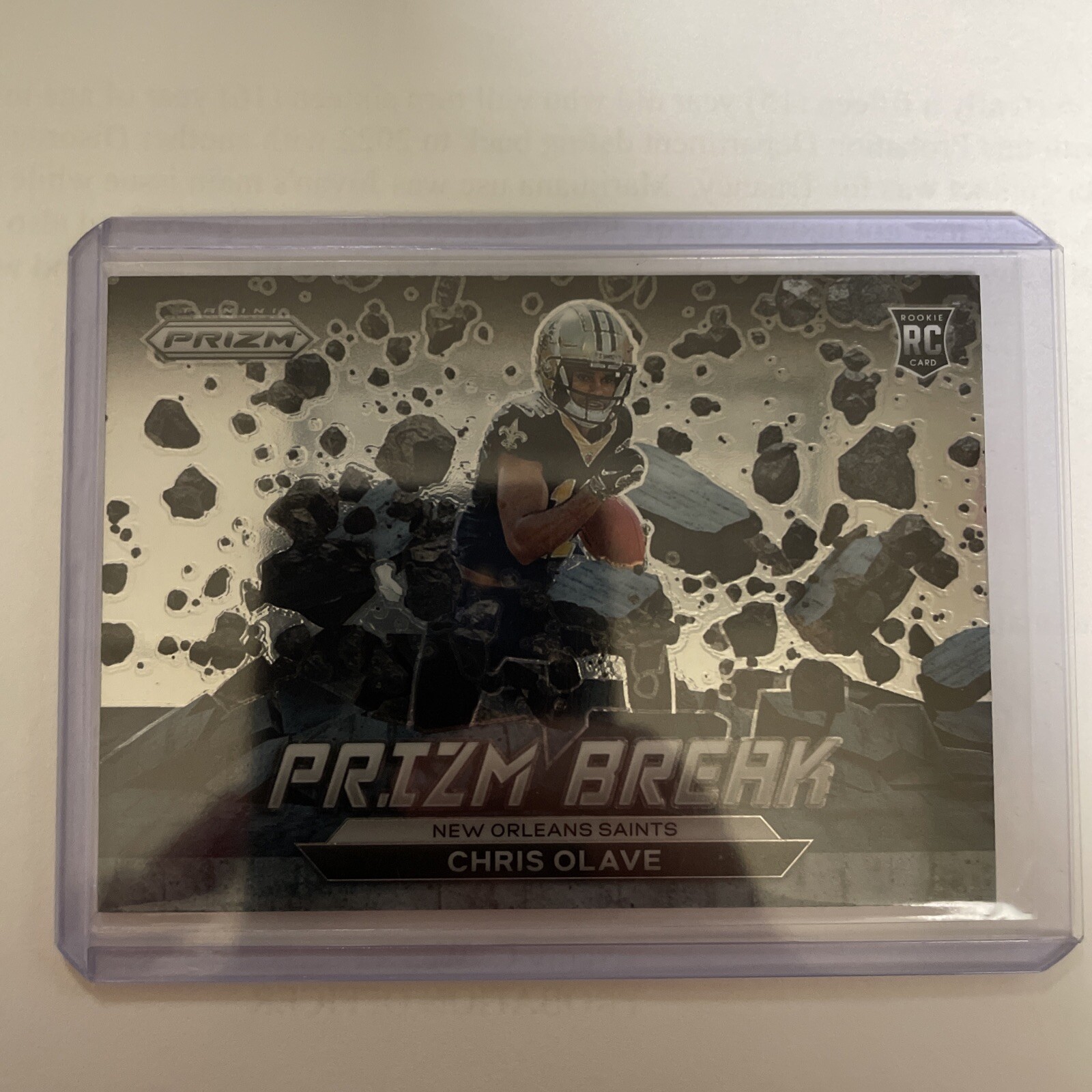 2022 Panini Prizm Chris Olave Rookie Card Prizm Break New Orleans Saints RC PB10