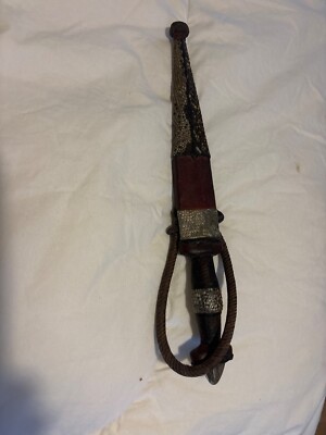 Snakes, skin sheath, full shank knife. 
