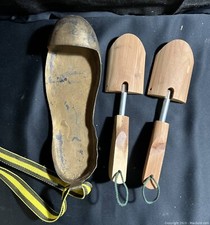 Brass left shoe w makeshift ankle tie Sz13  a Pair of wooden shoe inserts Sz12