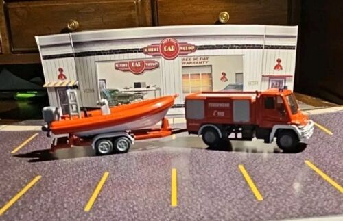 SIKU Unimog Fire Truck With Boat