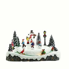 CARILLON di NATALE PISTA di PATTINAGGIO su GHIACCIO LUCI LED E MOVIMENTO 60032