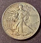 1986 .999 FINE SILVER EAGLE WALKING LIBERTY DOLLAR COIN IN VERY NICE CONDITION