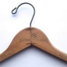 Vintage HILTON HOTELS "AROUND THE WORLD" Wood Clothes Hanger 19"