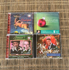 4 Assorted Christmas CDs. Lot of 4 Sealed NWT Nat King Cole, Rudolph And Others