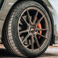 Japan Racing JR21 18x8.5 Matt Bronze ET20/40 5x120 + Bridgestone Potenza